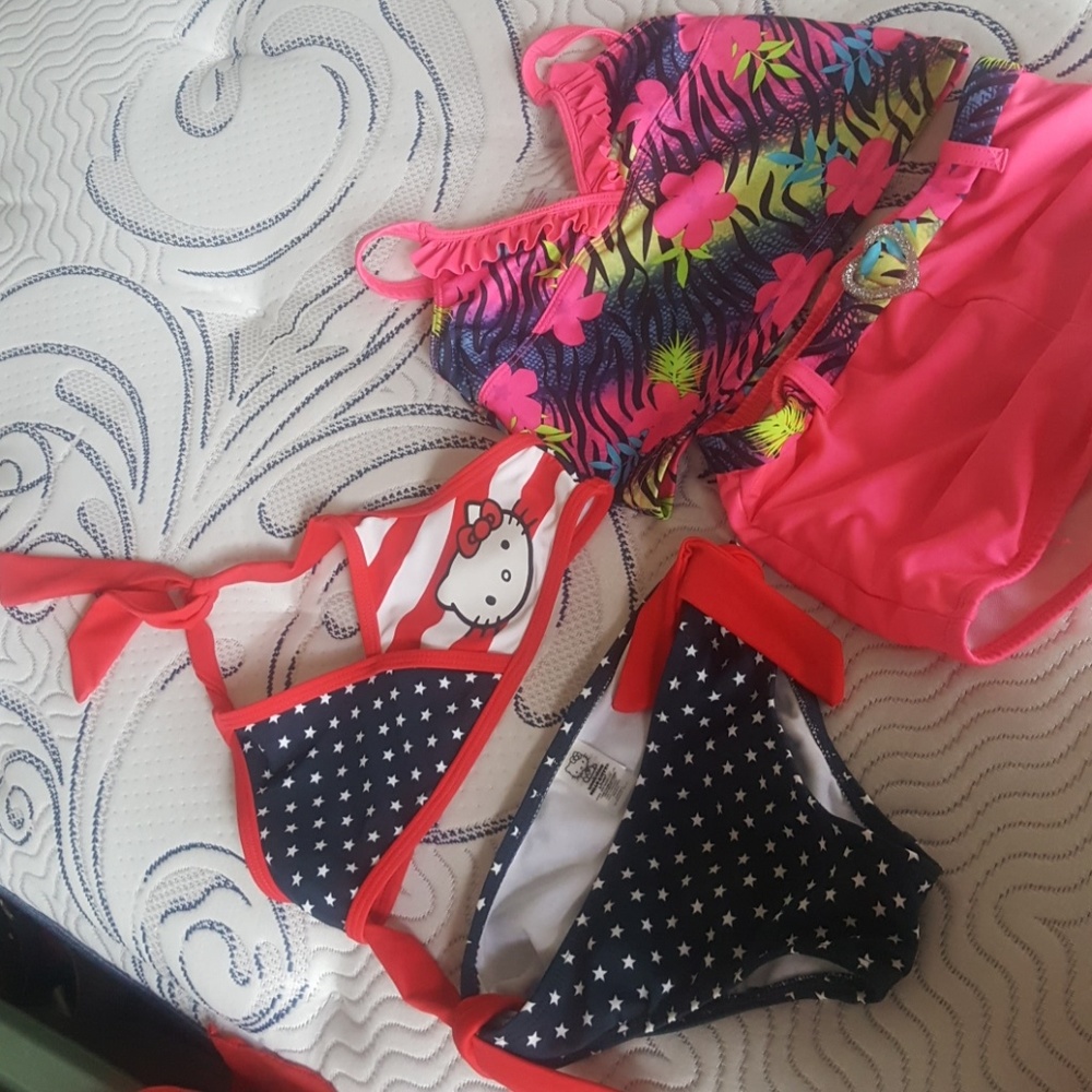Girls bathing suits  $10 for both one never  used