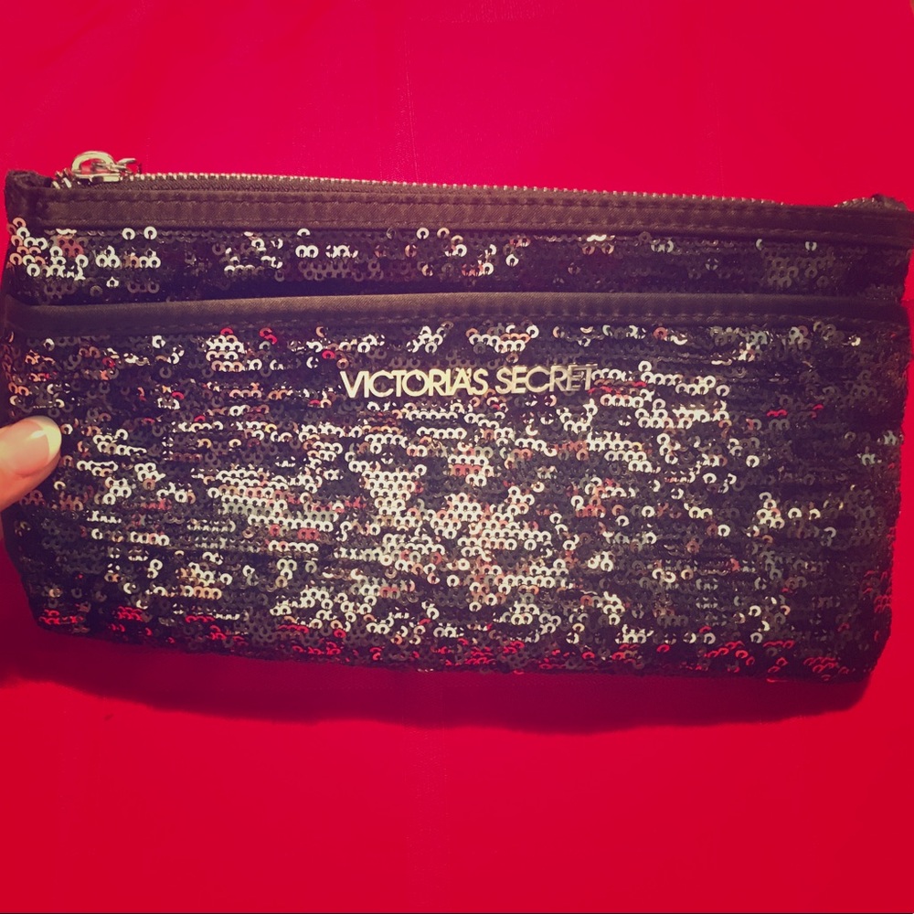 Black Sequence Victoria Secret clutch.