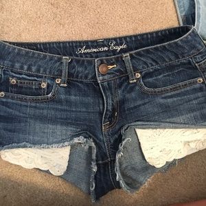 Jean shorts with lace detail on pocket