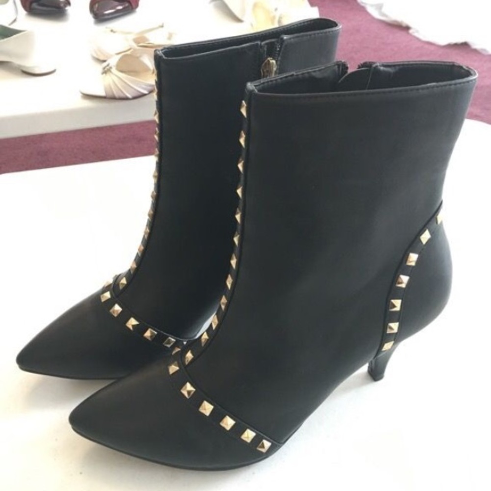 Black booties with gold studs