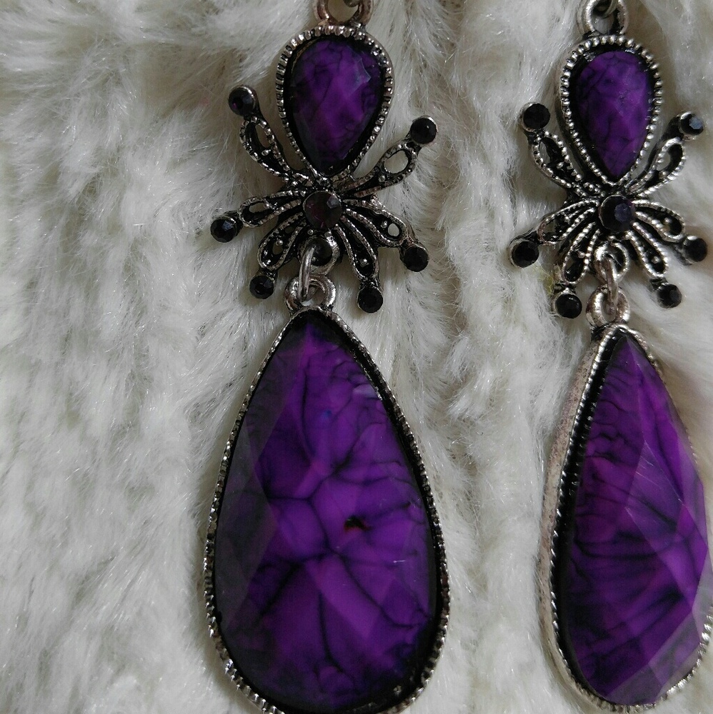 Purple tibetan dangle ear rings.