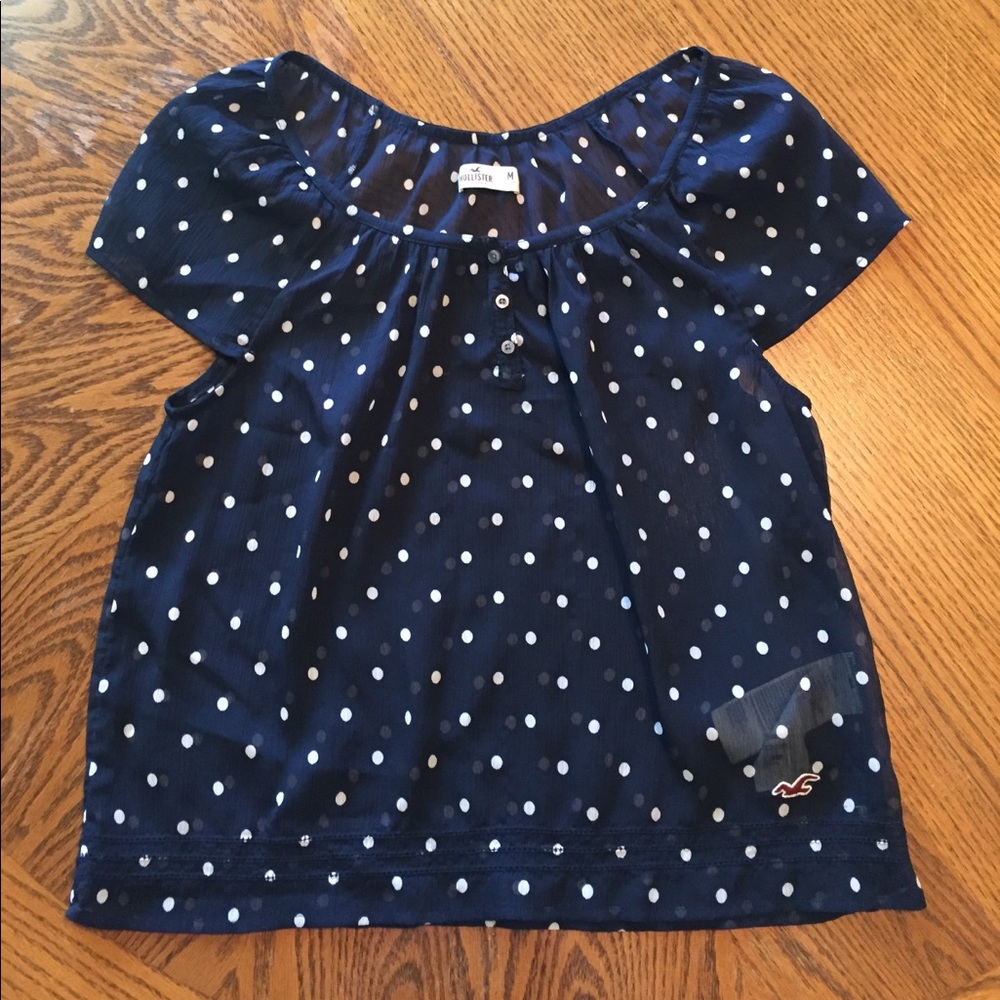 Navy and polka dot short sleeve shirt