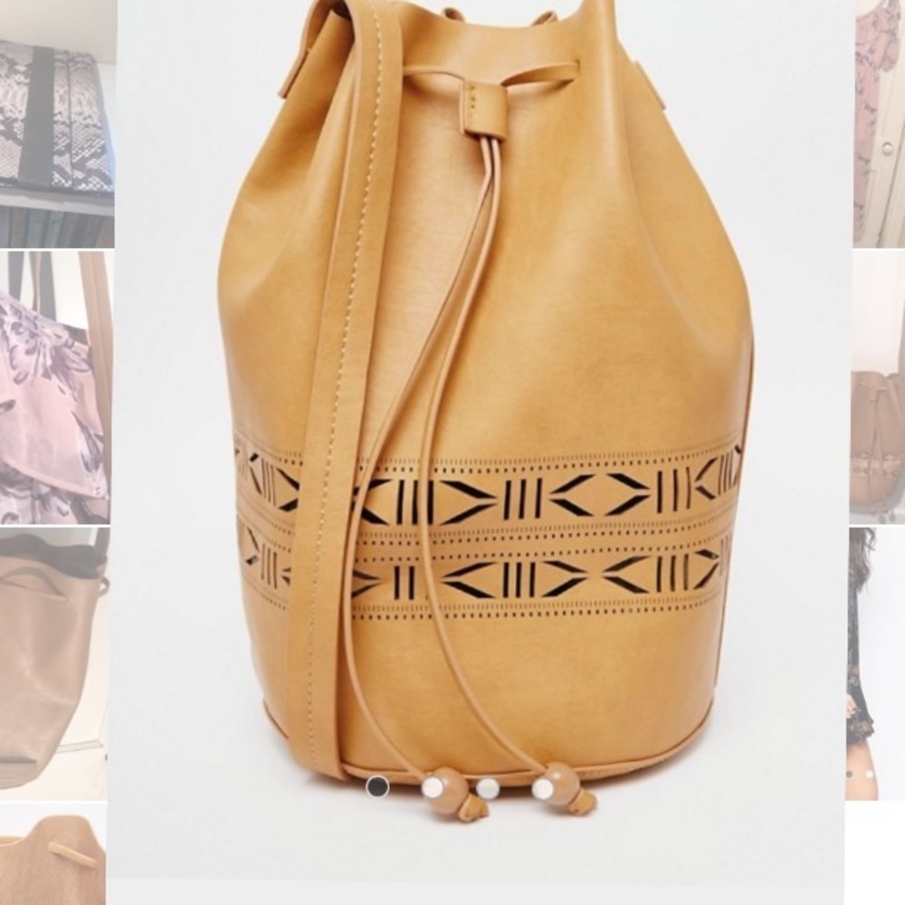 Cut Out Design Leather Drawstring Bucket Bag