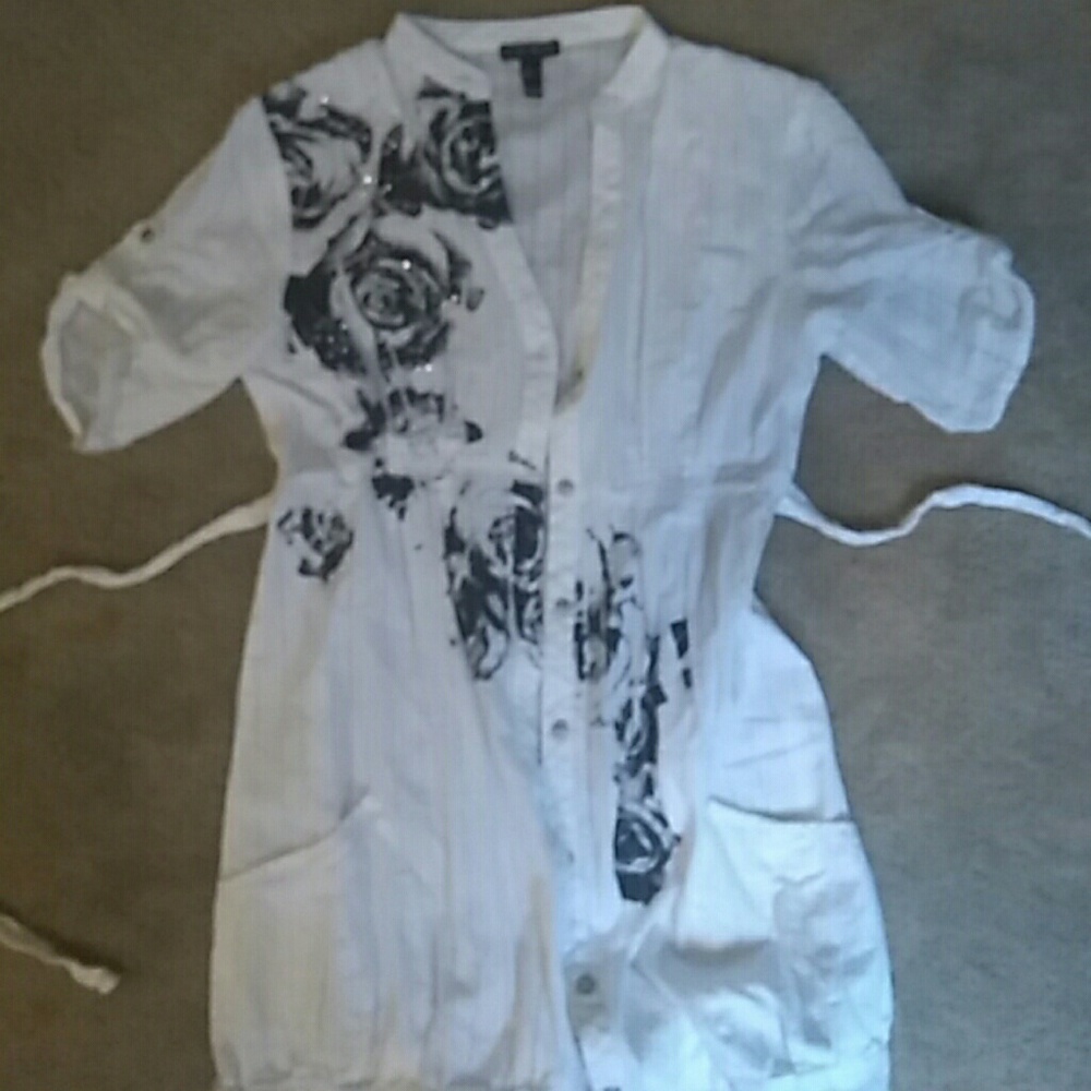 white with black floral design F.A.N.G shirt