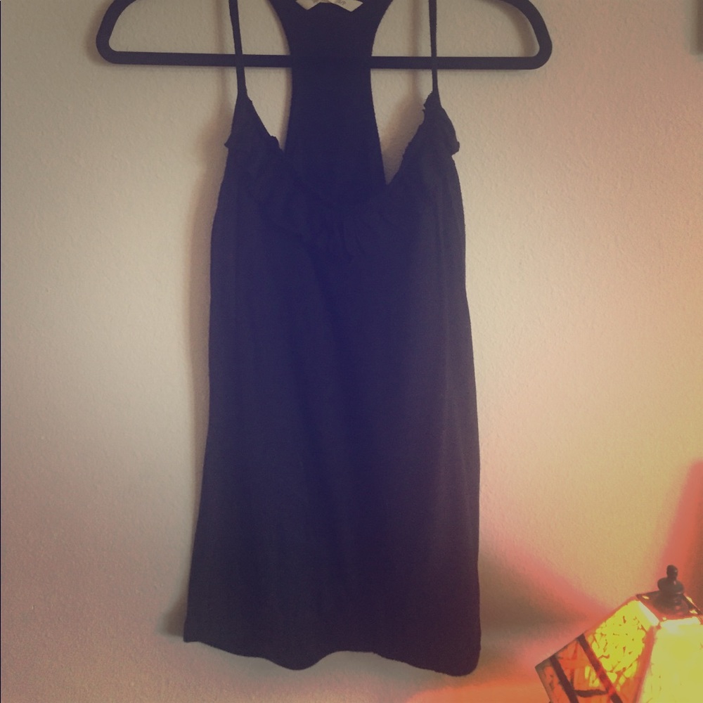black tank top with small detail around neck line