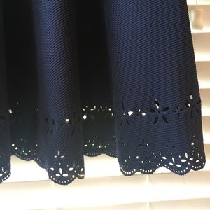 Adorable navy dress with hem detail