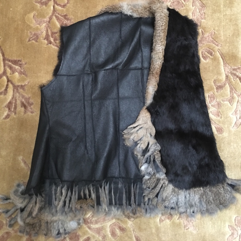 Fur black leather vest sz M. No trades.