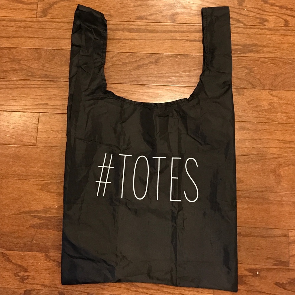 #TOTES black tote bag w/ Slit Pocket inside.
