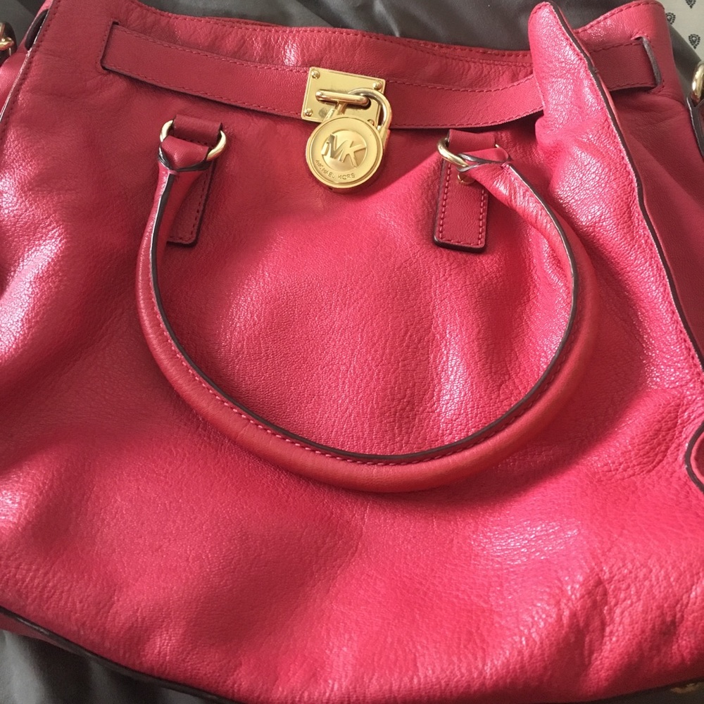Hot pink Michael Kors bag.