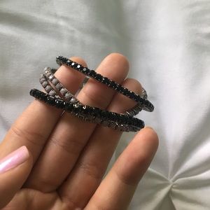 Black and gray set of bracelets