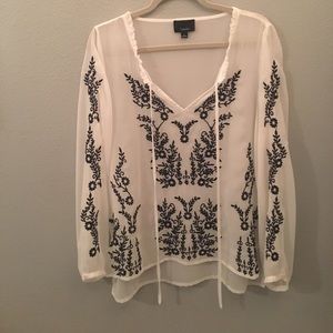 A blouse from the brand lumiere