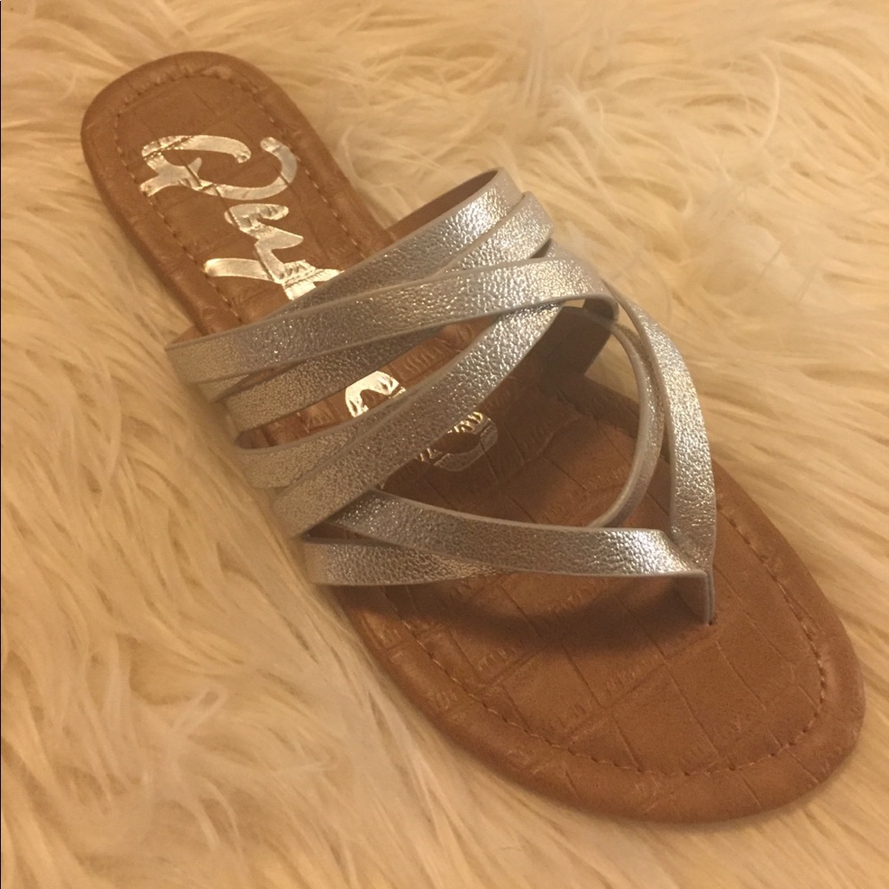 NIB silver slip on sandals