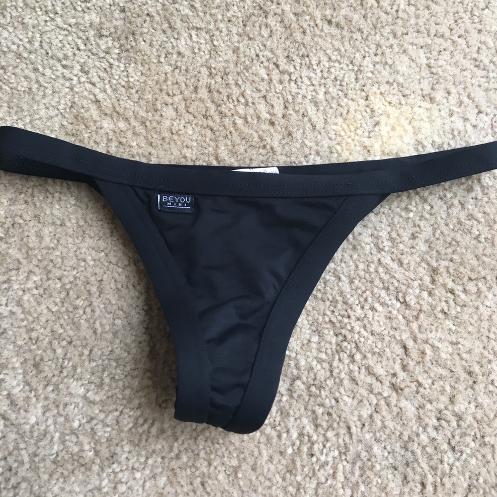 Cheeky black bikini bottoms