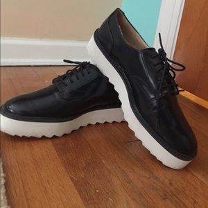 Black platform lace up shoes