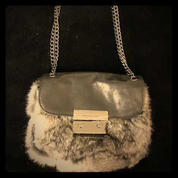 Michael Kors Handbags - 🎄 Sale! NWOT Michael Kors mini silver fur purse
