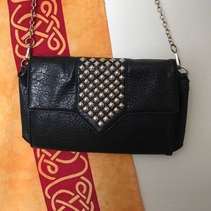 Studded black cross body bag