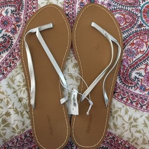 Brand New with Tags silver Flip flops