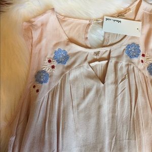 Embroidered blush colored tank top