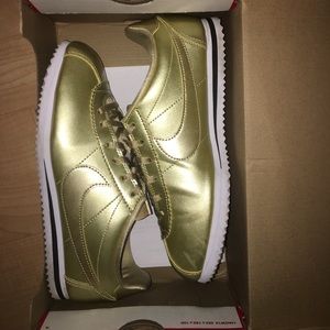 Gold/white Nike Cortez 6Y 8 women