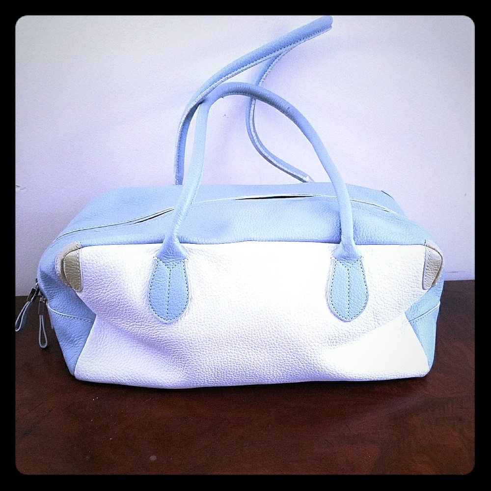 White and powder blue handbag