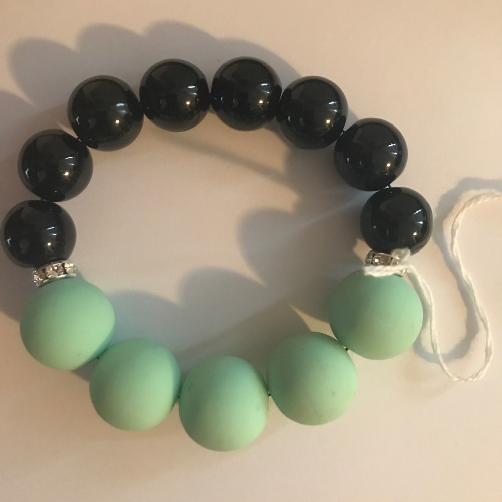 Green rubber and black glass bracelet