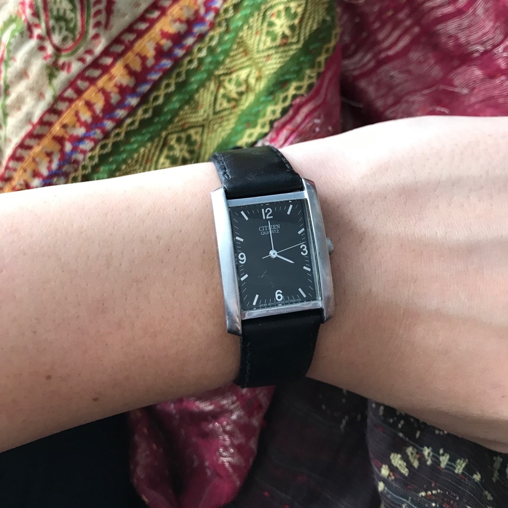 black leather water resistant watch