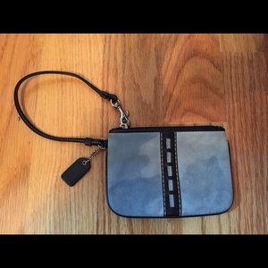 Black and blue Coach wristlet