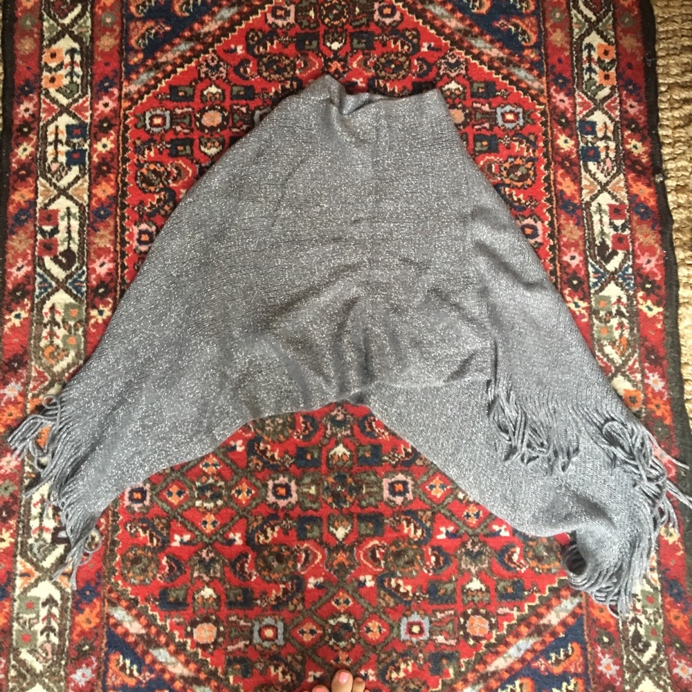 Fun silver poncho with metallic thread detailing!