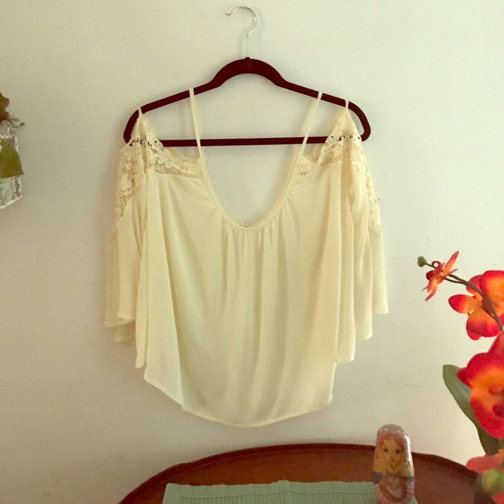 Off shoulder, laced, off white top.