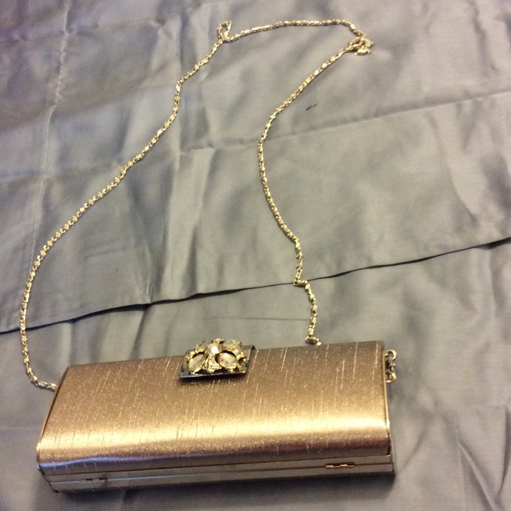 Evening purse with jeweled closure.