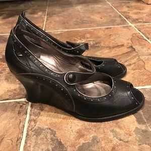 Black Mary Jane peep toes wedges