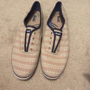 Tan keds with flowers