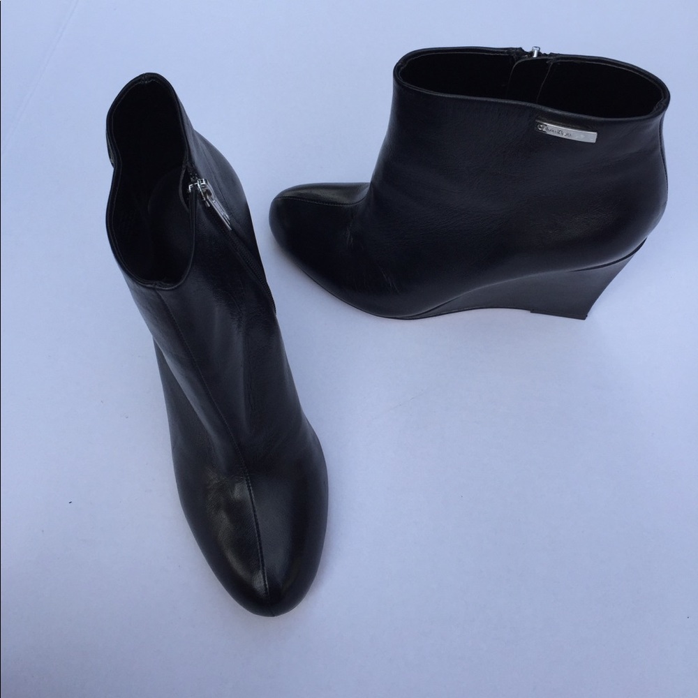 Calvin Klein black leather boots