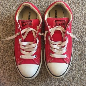 Red converse slip ones