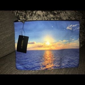 NWT Sunset cosmetic bag