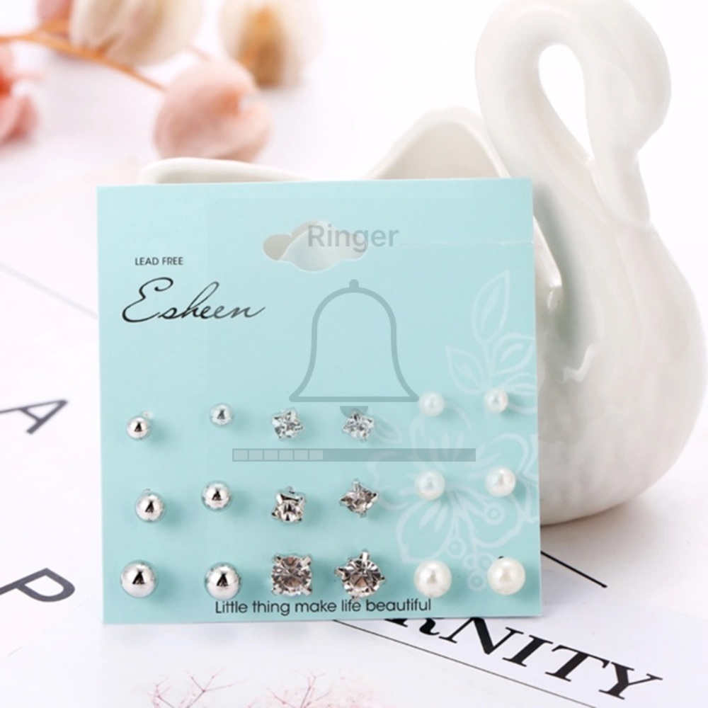 9 pair set of silver stud earrings