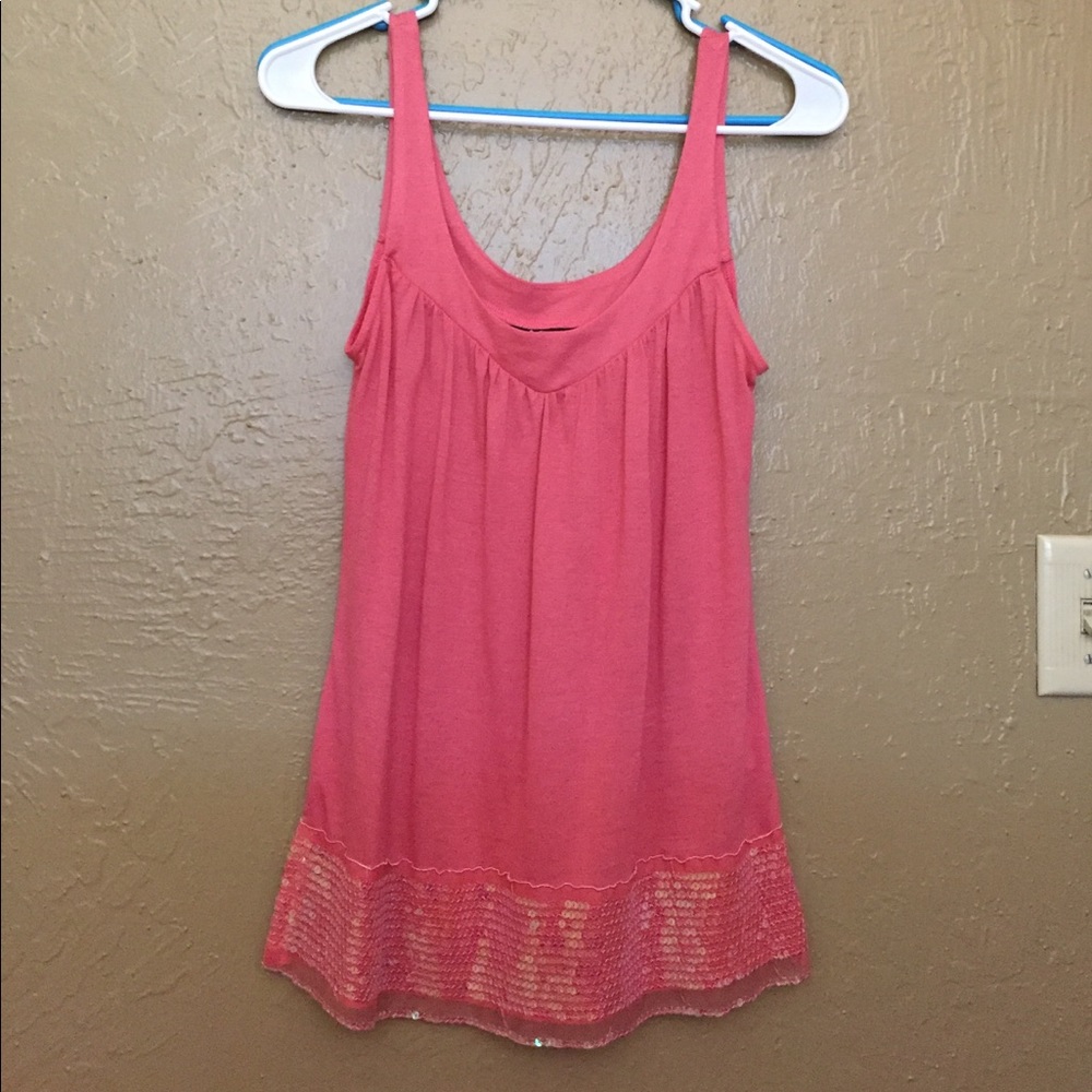 Cute pink top never been worn.