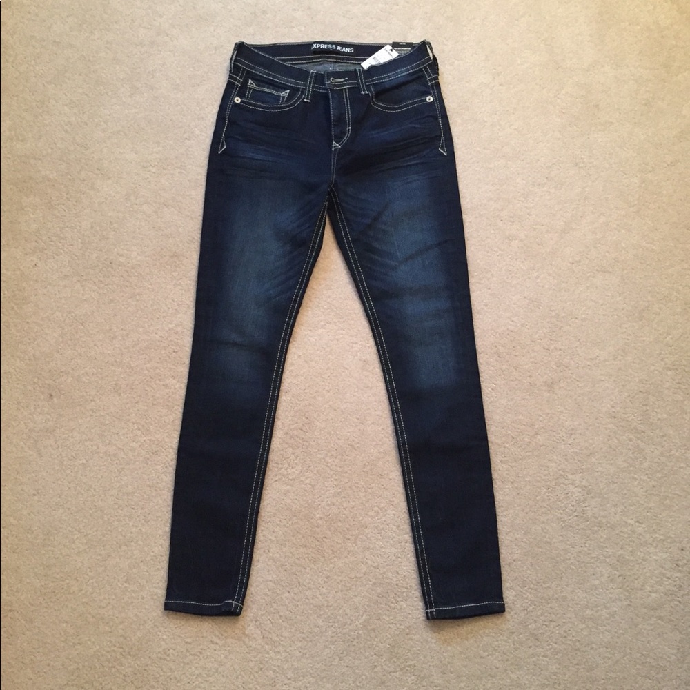 Express dark wash mid rise jeggings