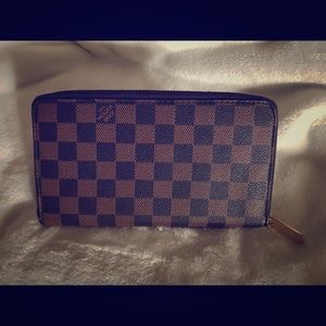 LV damier wallets. Price drooped.