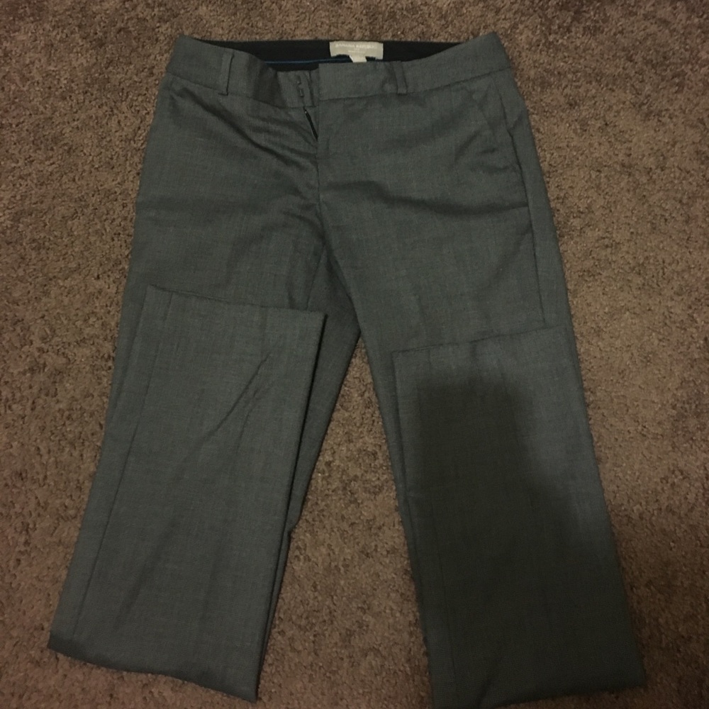 Gray Banana Republic slacks.
