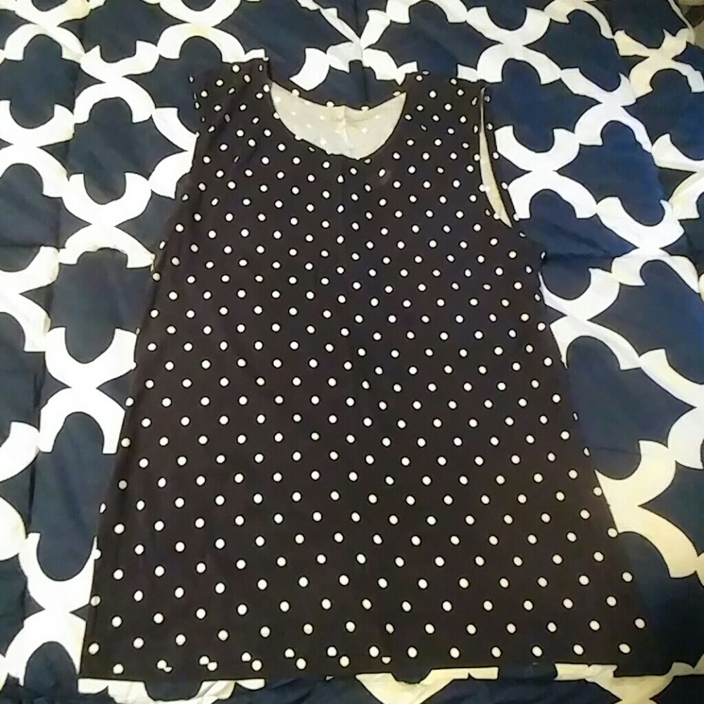 Polka dot sleeveless top.