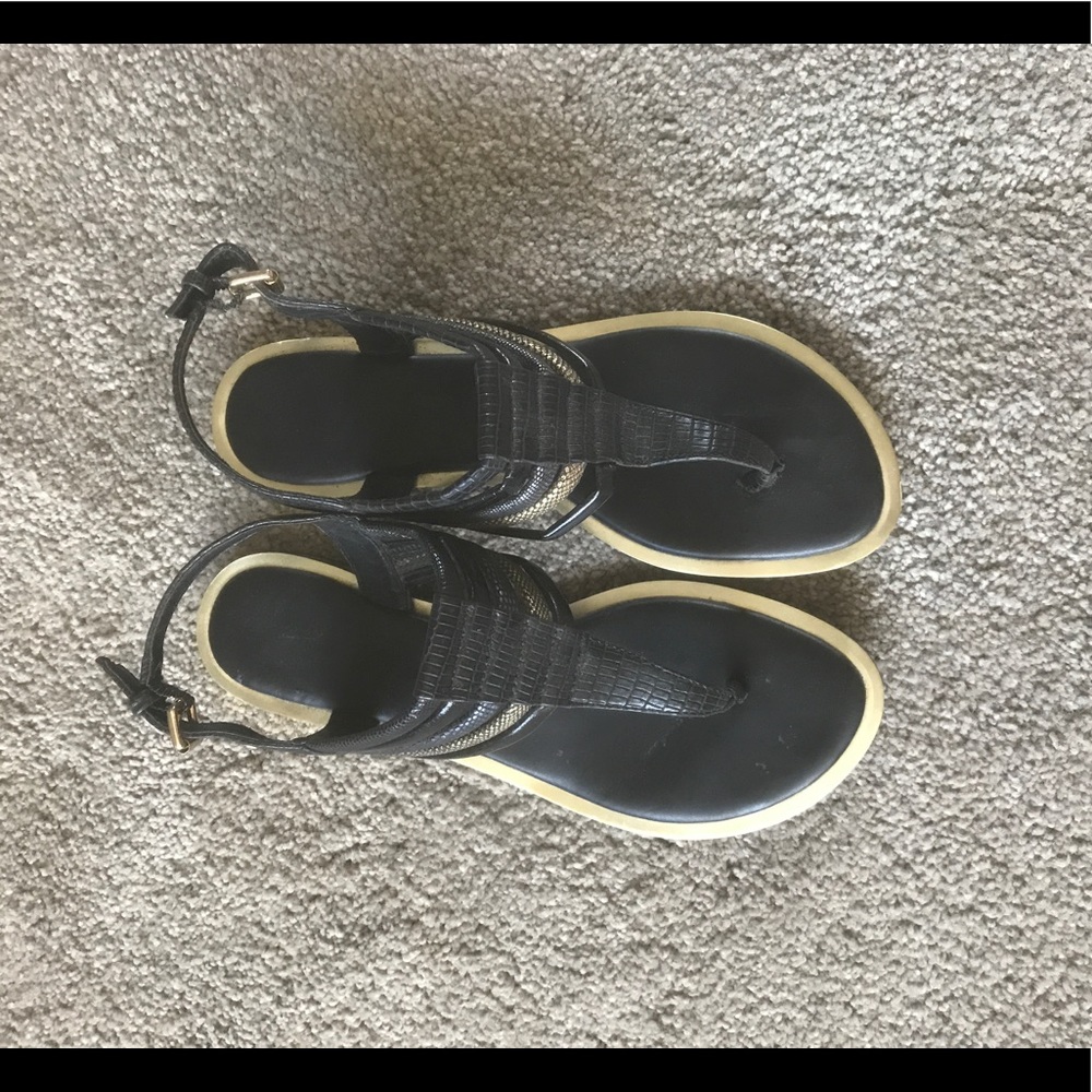 Also black and gold sandals
