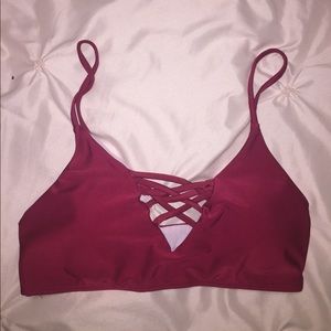A maroon bikini top