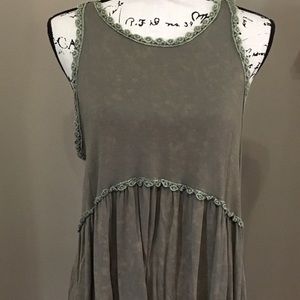 White washed green sleeveless tunic.