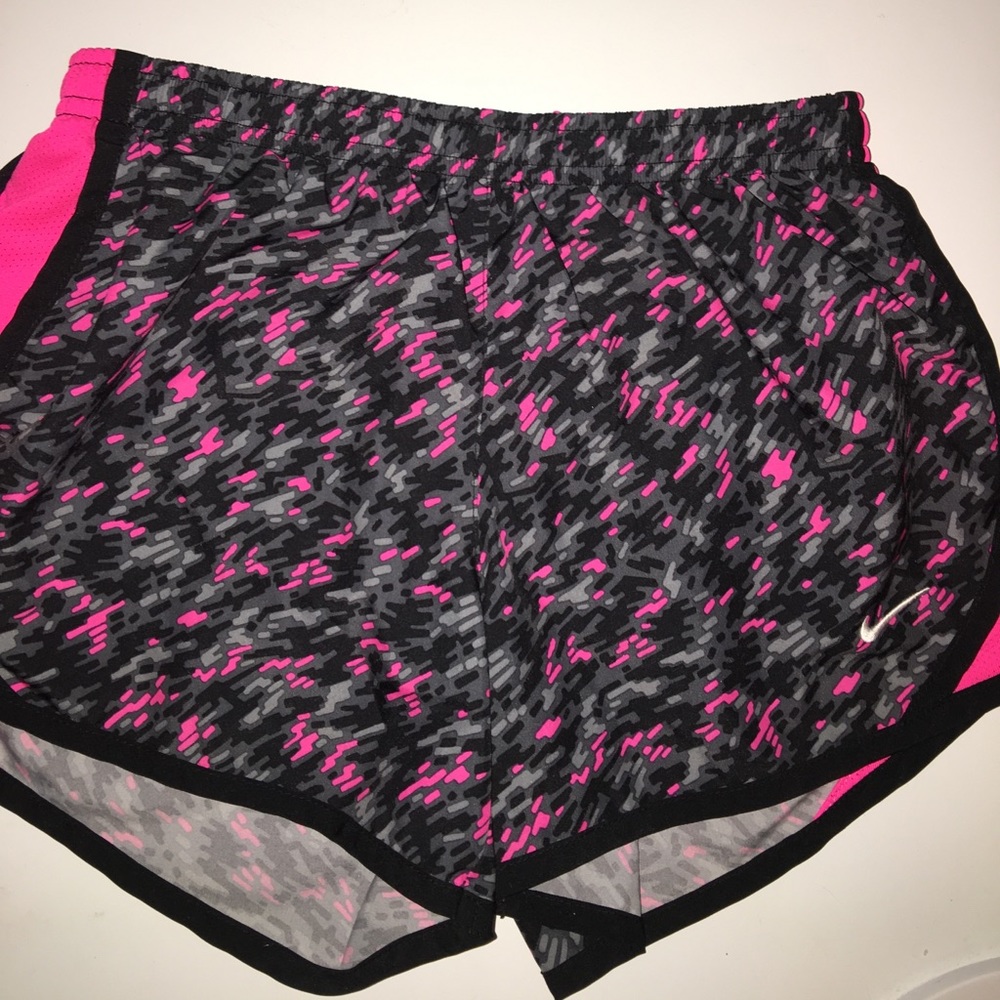 Girls Nike shorts fit like a woman's XS