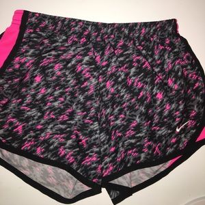 Girls Nike shorts fit like a woman's XS