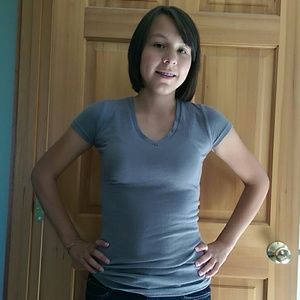 Shirt with ribbon on the back