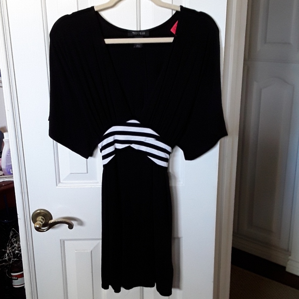 Black dress with stripe tie n back bow.....classy