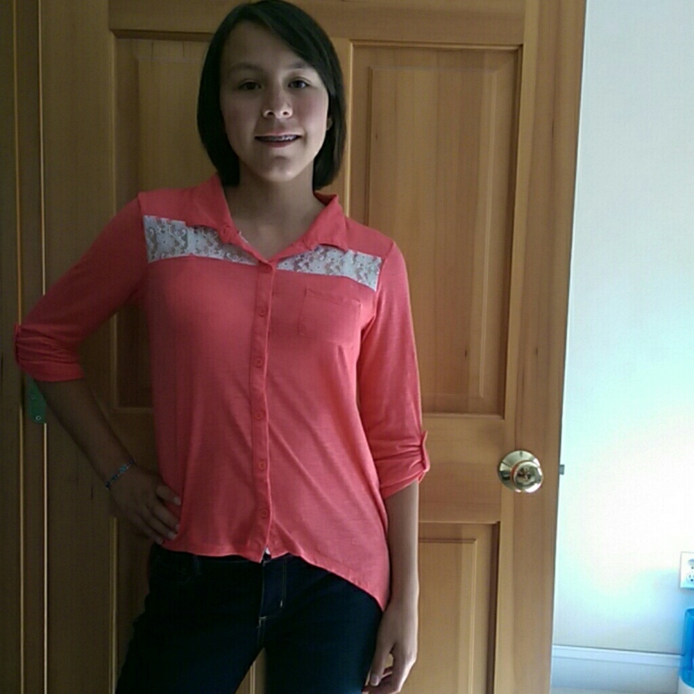 Pink and white lace blouse.