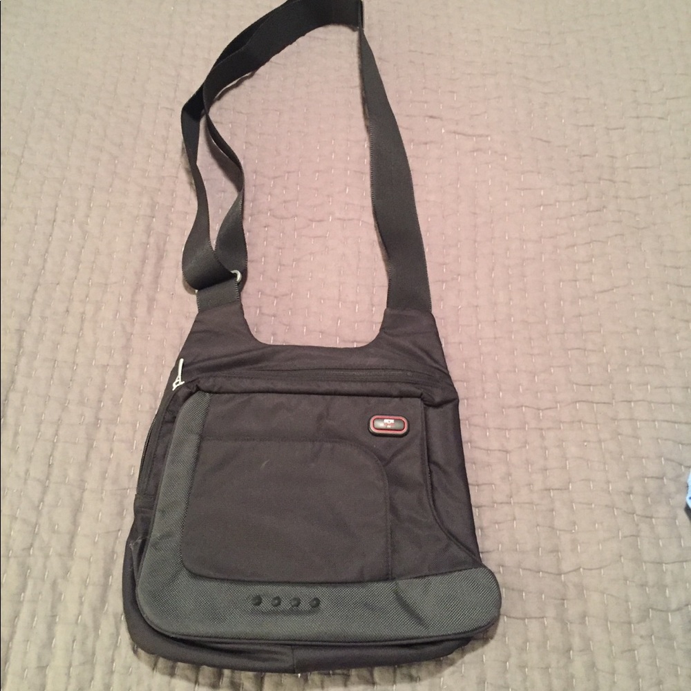 Tumi cross body bag - perfect condition.